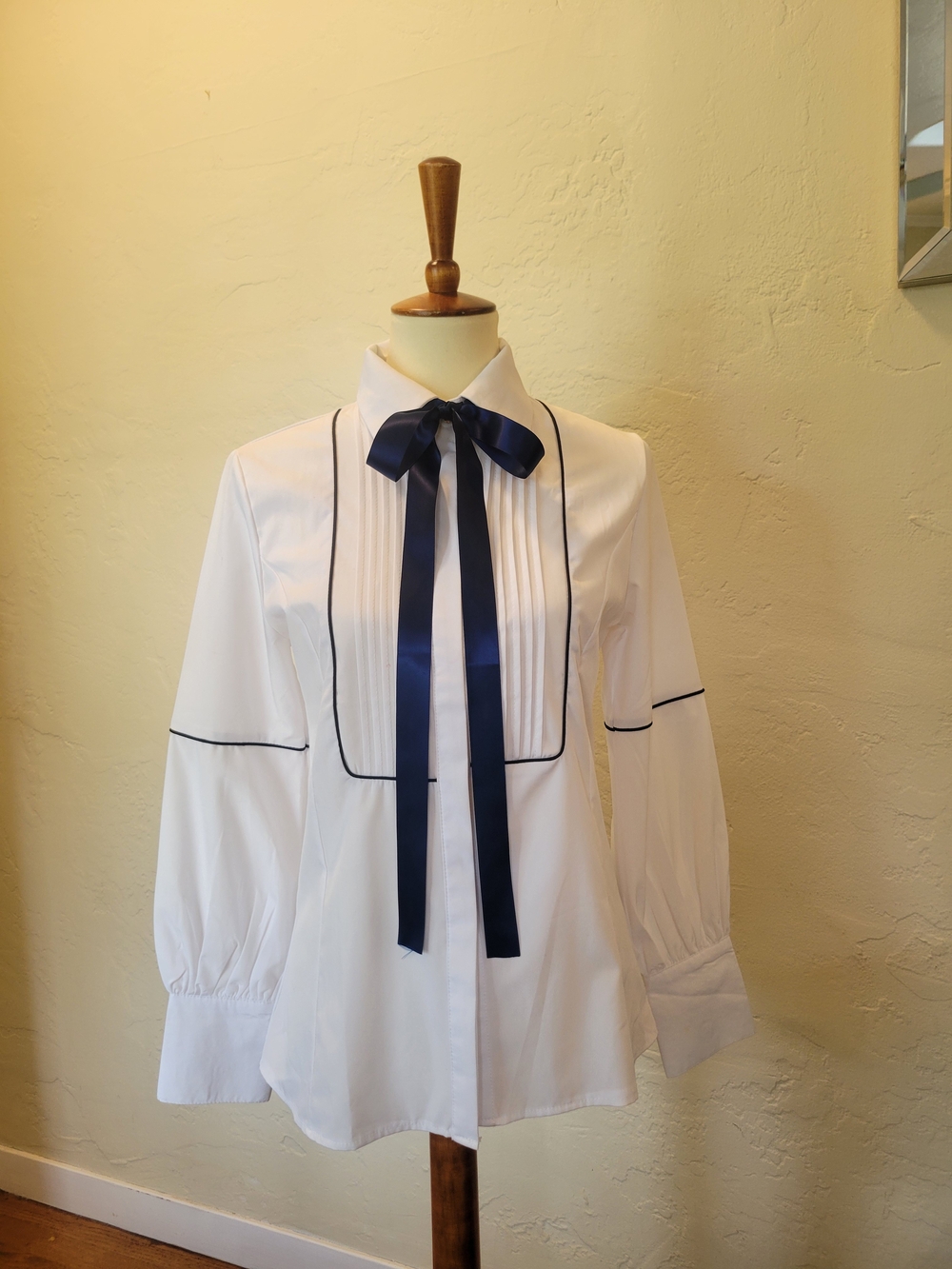 Women's White Pintuck Blouse with Navy Ribbon Tie